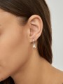 925 Silver Rhodium Plated Earring styled with Clear Man made Cubic Zirconia